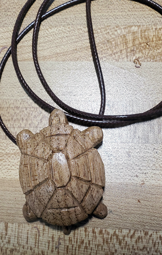 hand carved turtle pendant