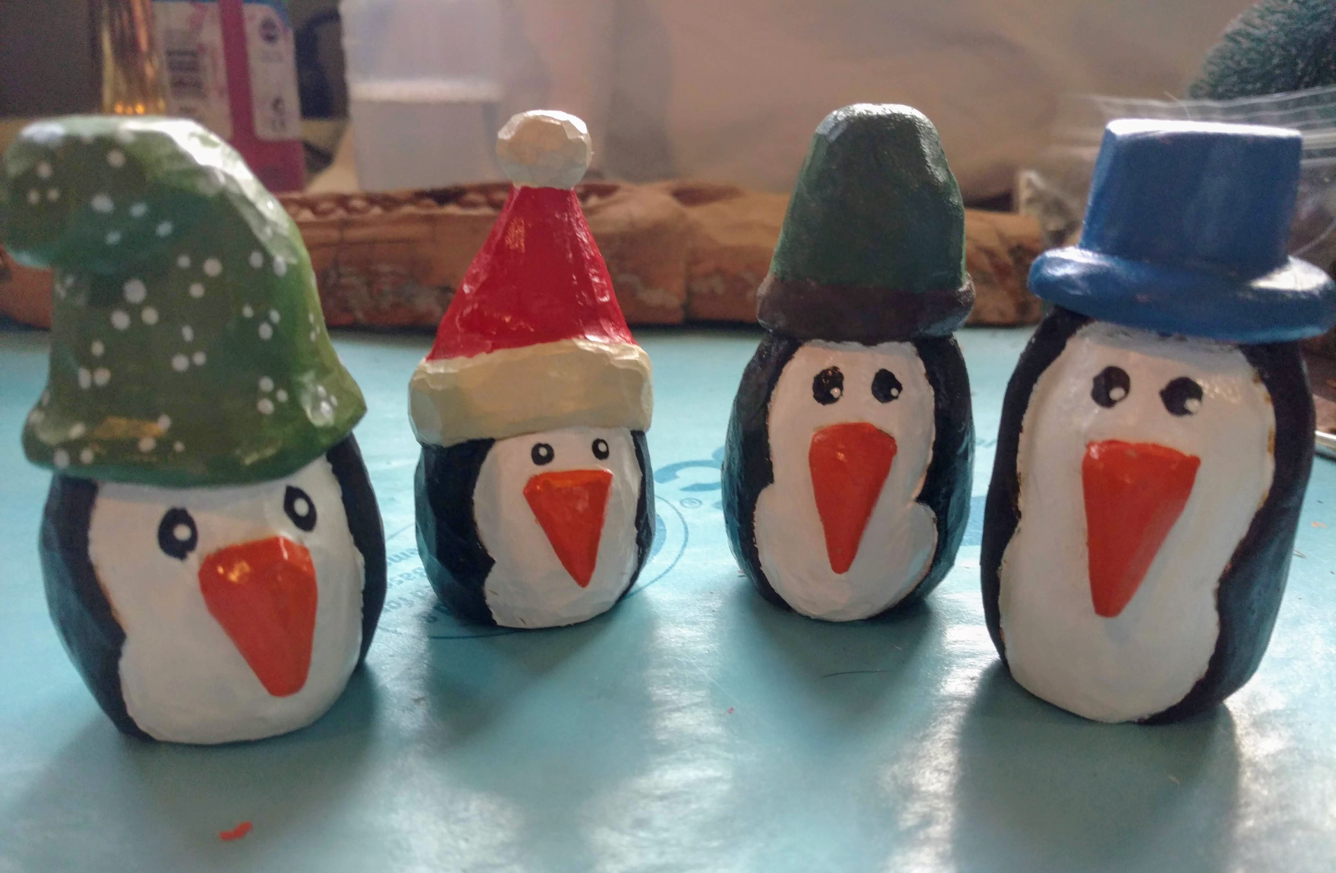 hand carved penguins